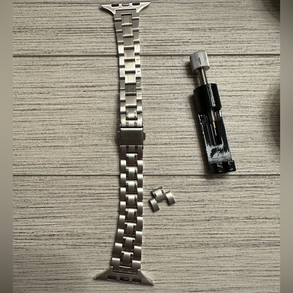 Stainless Steel Silver Watch Band with Link Tool. Worn with a Fitbit Sense 2.